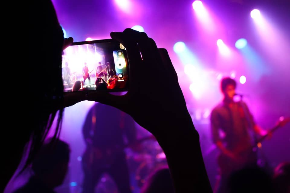 taking a picture in a music concert